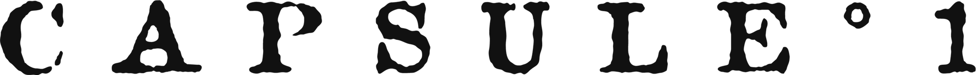 Text 'CAPSULE °1' in a stylized font on a plain background